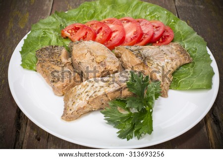 fish stew on the plate placed on the table