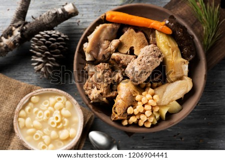 sopa de galets or escudella de Nadal, and carn d olla, soup with galets pasta and the meat and vegetables used in the broth, typically eaten on Christmas in Catalonia, Spain Zdjęcia stock © 