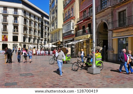 MALAGA, SPAIN - MARCH 12: Calle Larios on March 12, 2012 in Malaga, Spain. This 300 meters long street is the main commercial street of the city and the fifth most expensive shopping street in Spain