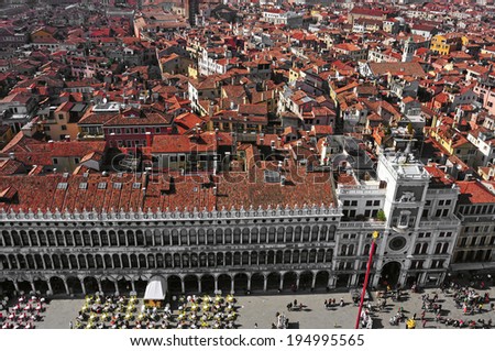 VENICE, ITALY - APRIL 12: Aerial view of Piazza San Marco on April 12, 2013 in Venice, Italy. Piazza San Marco is the main landmark in the city, which receives 18 million tourists per year