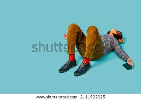 Similar – Image, Stock Photo Man lying down holding mirror with reflection