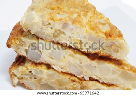 some pieces of typical spanish tortilla de patatas on a plate
