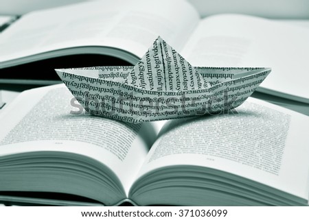 Similar – Image, Stock Photo read stories Wanderlust
