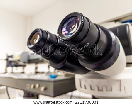 Oculars of complex, upright confocal microscope used for scientific research. Used for live imaging of biological samples to visualize processes in brain diseases. Stok fotoğraf © 