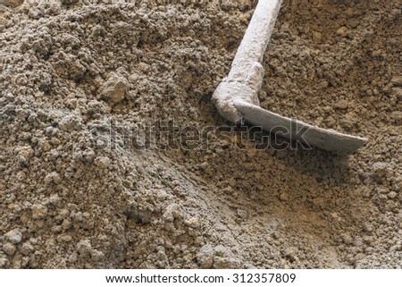 soil with hoe or digging tool