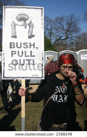 Man with sign at anti war rally on the National Mall, Washington, DC, Saturday, January 27, 2007.