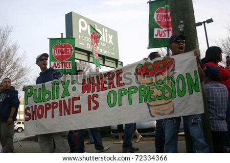 ATLANTA, GA - MAR. 2: The Coalition of Immokalee Workers (CIW) stages a protest on March 2, 2011, at a Publix supermarket in Atlanta over wages and working conditions for tomato pickers in Florida.