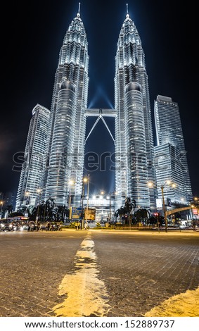 KUALA LUMPUR, MALAYSIA - JUNE 14: Petronas Twin Towers on June 14, 2013 in Kuala Lumpur, Malaysia. Petronas Towers are twin skyscrapers and were tallest buildings in the world until 2004
