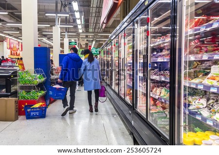 HUZHOU,CHINA - FEB 17: Supermarket shopping people on February 17th 2015 in Huzhou.The next day is the Chinese Lunar New Year,People prepare New Year.