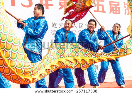 DEQING,CHINA - MAR 2: Dragon dance performances in Lantern Festival on March 2th 2015 in Deqing.Lantern Festival is a traditional festival of Chinese.