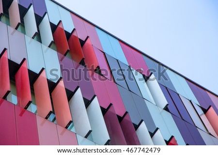 Similar – Image, Stock Photo Facade of modern multicolored building with narrow windows