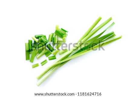 Fresh healthy organic green vegetable garlic chives, chinese chive sliced, green herb isolated on white background. Foto stock © 