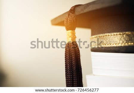 Graduation cap on Books step in Library room of campus and university, Concept of abroad international Educational, Back to School Zdjęcia stock © 