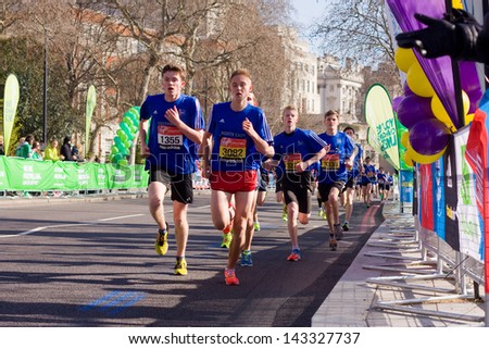 LONDON - APRIL 13: Unidentified children run the London marathon on April 13th, 2013 in London, England, UK. The marathon is an annual event.