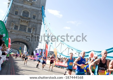 LONDON - APRIL 13: Unidentified men run the London marathon on April 13, 2014 in London, England, UK. The marathon is an annual event.