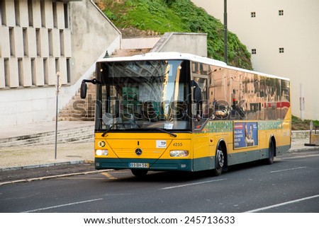 LISBON - JANUARY 11TH: A Portuguese bus on january 11th, 2015 in Lisbon, Portugal. Traveling by bus is Lisbon\'s cheapest mode of transport.