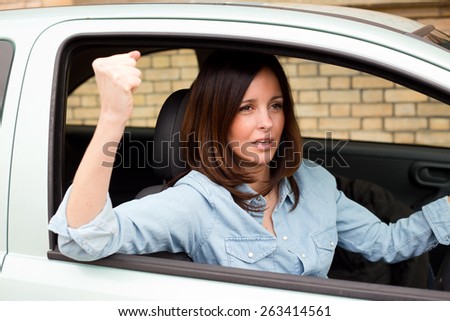 angry driver waving fist