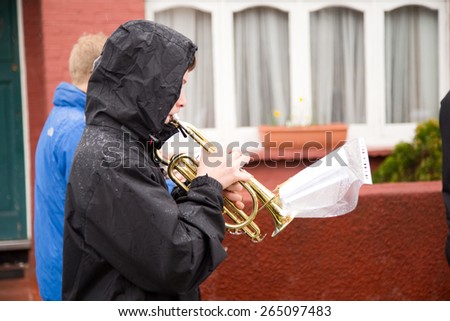 LONDON - MARCH 29TH: Unidentified musician at a palm sunday procession on March the 29th, 2015, in London, England, UK. Palm sunday is an annual religious celebration.