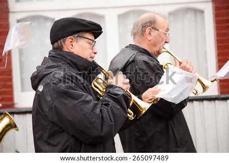 LONDON - MARCH 29TH: Unidentified musicians at a palm sunday procession on March the 29th, 2015, in London, England, UK. Palm sunday is an annual religious celebration.