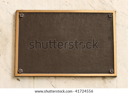 brass plaque outside building with copy space