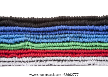 Part of multicolored knitted clothes pile