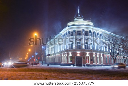 Crossroad near administration building in Vologda city, Russia during blizzard.