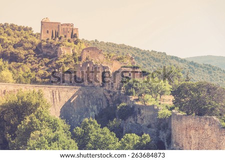 View of Saint Saturnin les Apt, Provence, France. Castle ruins on a hill above the village