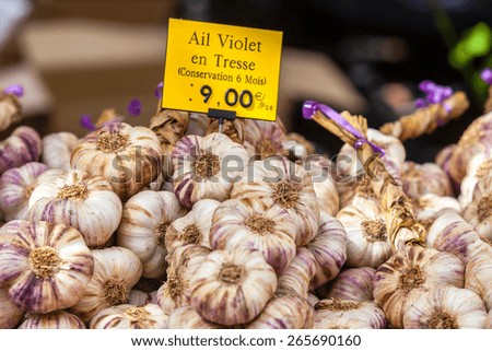 Garlic bunches in a french farmers market. Shot with a selective focus