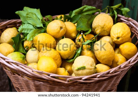basket with ripe lemons. closeup, small GRIP