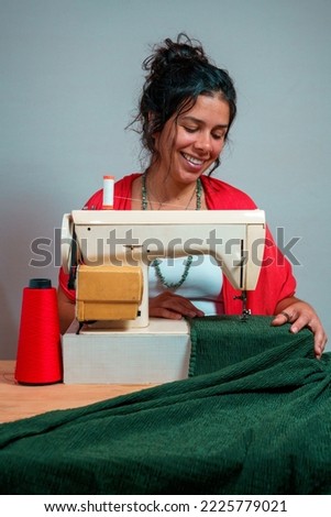 Similar – Foto Bild Schneiderin beim Nähen an der Maschine im Atelier