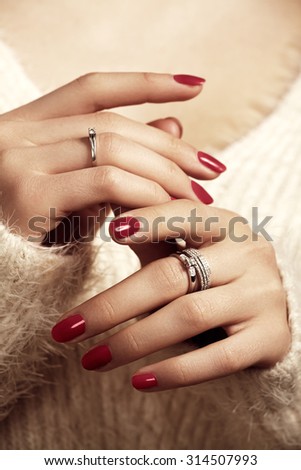 Female hands with beautiful red fashion manicure