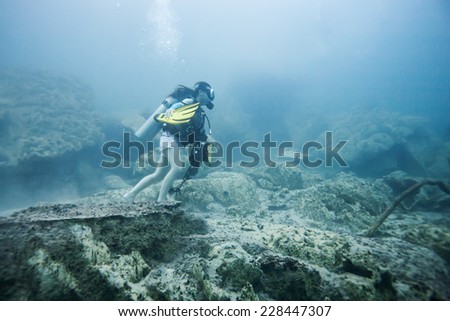 Scuba diving climb the mountain under the hot spring, hot water make vision blurry in Coron area, Palawan, Philippines.