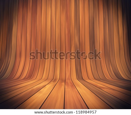 An empty room with continuous wood from wall to floor