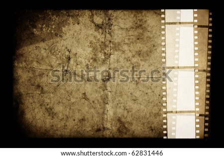 An old white film frame on an old grunge paper