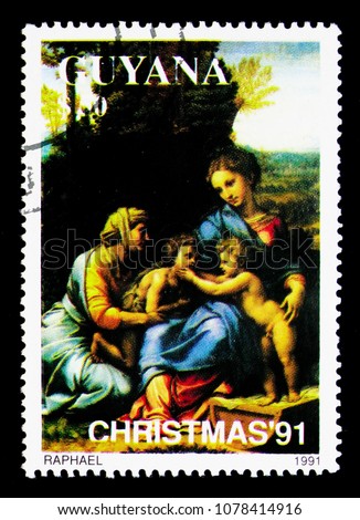 MOSCOW, RUSSIA - MARCH 28, 2018: A stamp printed in Guyana shows Raphael, Christmas serie, circa 1991