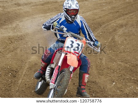MOSCOW - JUNE 24: V.Korchnoy ride on a clubs tournament of motocross competition of Red Racing Group club on June 24, 2012 in Moscow, Krilatskoe, Russia