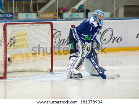 MOSCOW - JANUARY 28, 2014: Eremenko Alexander (1), goalkeeper, in action during the KHL hockey match Dynamo Moscow vs Slovan Bratislava in sport palace Luzhniki in Moscow, Russia. Final score 2:3