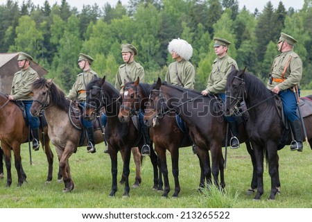 RUSSIA, CHERNOGOLOVKA - MAY 17: Cavalry soldiers stands in row on History reenactment of battle of Civil War in 1914-1919 on May 17, 2014, Russia