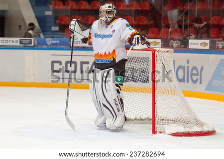 MOSCOW - DECEMBER 3: Goalkeeper Shtepanek Y. (33) resting during the game CSKA vs Severstal on Russian KHL premier hockey league Championship on December 3, 2014, in Moscow, Russia. CSKA won 9:1