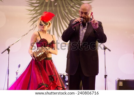 MOSCOW - DECEMBER 26: Russian singer Mikhail Shufutinskiy sing a song on a New Year concert on December 26, 2013 in Moscow, Russia