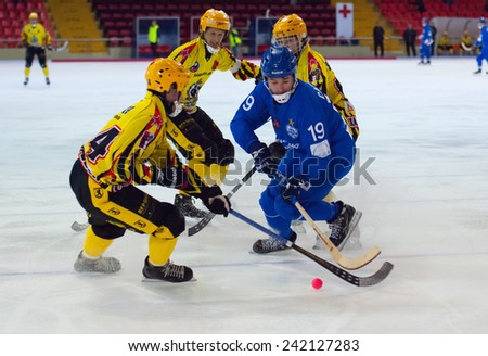 MOSCOW - DECEMBER 12, 2014: Saveliev Dmitry in action during the Russian  bandy league game Dynamo Moscow vs SKA Neftyanik in sport palace Krilatskoe, Moscow, Russia. Dynamo won 9:1