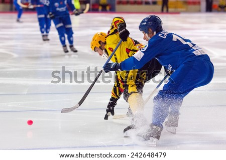 MOSCOW - DECEMBER 12, 2014: Saveliev D. (19) fight during the Russian  bandy league game Dynamo Moscow vs SKA Neftyanik in sport palace Krilatskoe, Moscow, Russia. Dynamo won 9:1