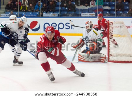 MOSCOW - JANUARY 10: V. Solodukhin (17) in attack on hockey game Vityaz vs Medvezchak on Russian KHL premier hockey league Championship on January 10, 2015, in Moscow, Russia. Medvezcak won 3:2