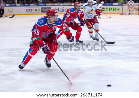 MOSCOW - MARCH 12: Bogdan Kiselevich (55) attack on hockey game Yokerit vs CSKA on Russia KHL championship on March 12, 2015, in Moscow, Russia. CSKA won 3:2