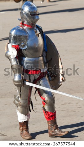 RUSSIA, MOSCOW - MARCH 14: Unidentified knight with a sword in armor on history reenactment of the Medieval maneuvers in Moscow, 14 March, 2015, Russia