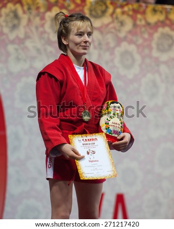 RUSSIA, MOSCOW - MARCH 27: Winner, Elena Bondareva,  stand on podium on World Sambo Championship Kharlampiev memorial in Luzhniki sport palace, Moscow, Russia, 2015