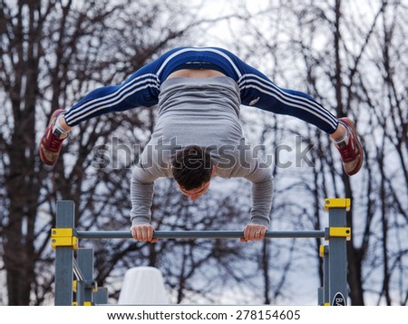 RUSSIA, MOSCOW - APRIL 18: Unidentified man on Street workout place on event of 80th anniversary of Spartak team in Luzhniki, Moscow, Russia, 2015