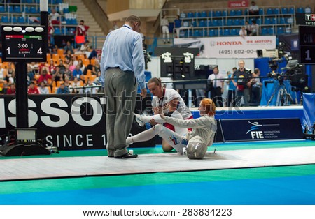 MOSCOW, RUSSIA - MAY 31 2015: A. Shatalova get injured on the World fencing Moscow Sabre Grand Prix in Luzhniki sport palace