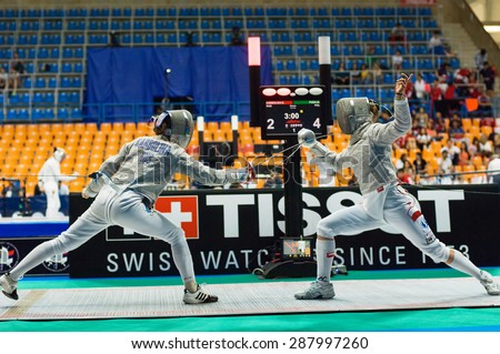 MOSCOW, RUSSIA - MAY 31 2015: Eugene Karbolina and Marta Puda fights on the World  fencing Grand Prix Moscow Saber in Luzhniki sport palace