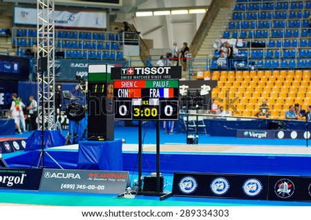 MOSCOW, RUSSIA - MAY 31 2015: C. Shen and F. Palu score board on the World  fencing Grand Prix Moscow Saber in Luzhniki sport palace